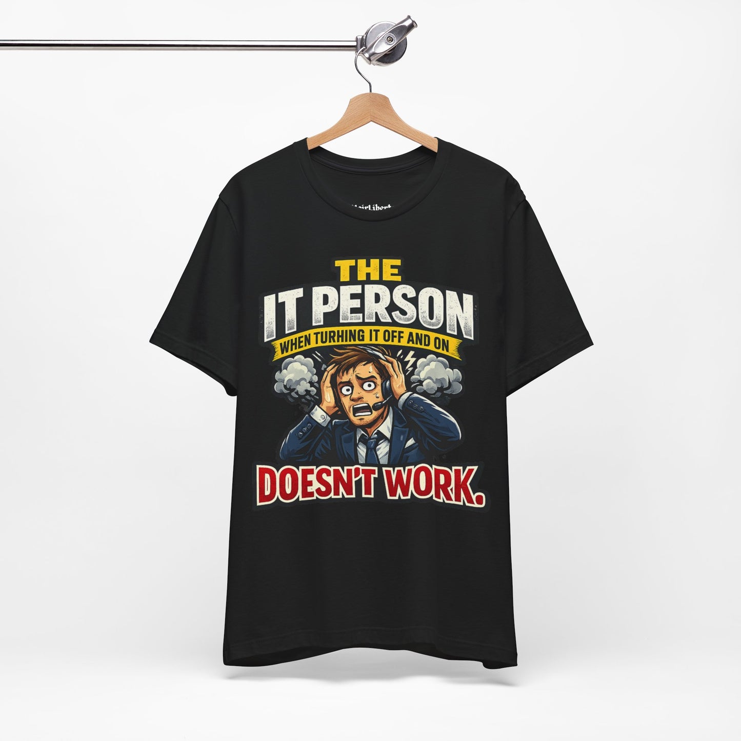 Funny shirt with a workplace graphic phrase, Hanging from a cloth hanger