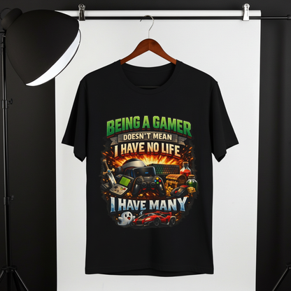Funny shirt with a graphic phrase about gamers having multiple lifes, hanging from a cloth hanger, Black